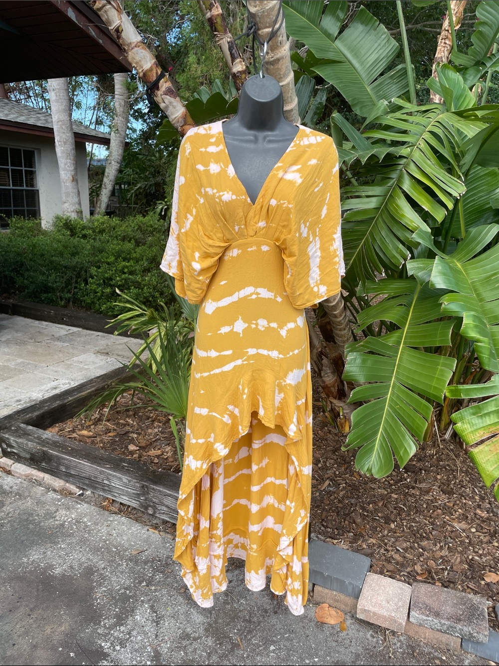 yellow tie-dye ruffled Hilow dress by Young Fabolous, and broke